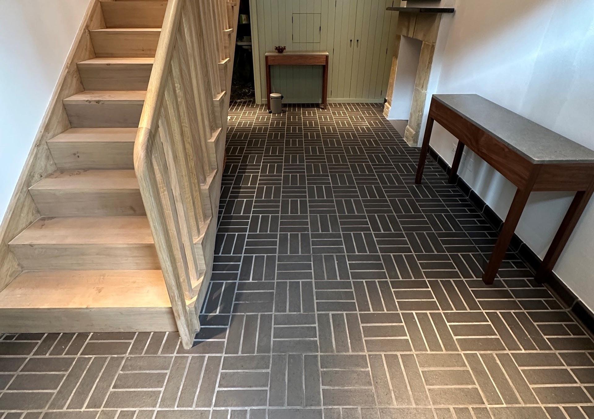 Staffs blue quarry tiles with skirting by Marwan Interior